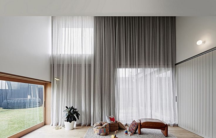 How to Complete a Living Room with Sheer Window Curtains?